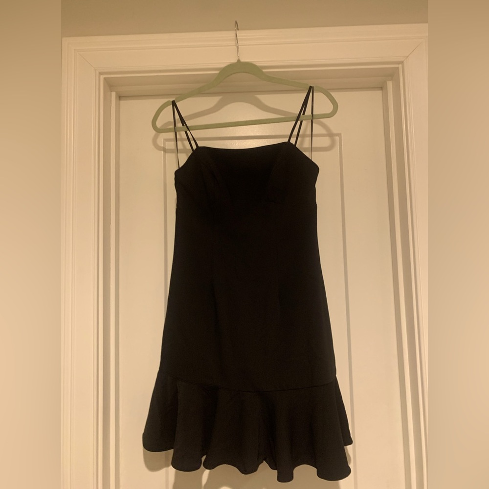 Elliatt women’s black dress with flounce hem detail
